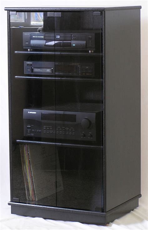 Of Small Black Oak Tv Stand With Gray Tint Glass Doors Entertainment