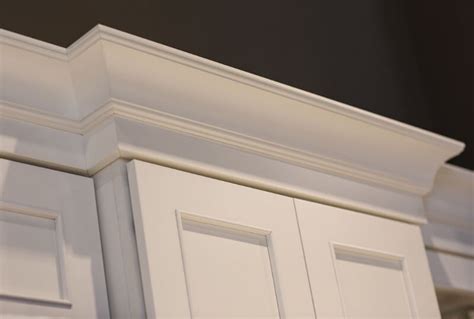 Now to continue with my kitchen transformation we've added crown molding to the top of the cabinets. FAQ: Crown Molding for Cabinets - Dura Supreme Cabinetry