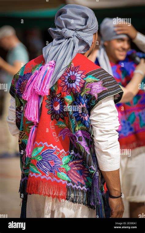Two Mexican Men With Traditional Dress With Floral Texture And