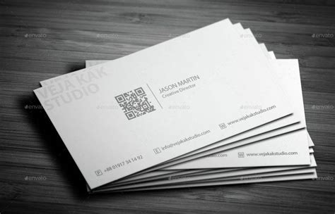 Name should be 1 point bigger or set in a bold typeface. creative director minimal business card example