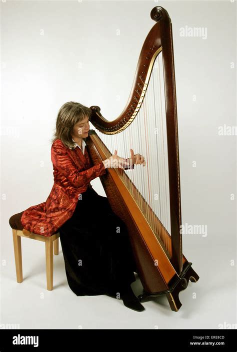 Welsh Triple Harp Being Played By Eluned Pierce Wearing Traditional