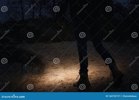 Man With Flashlight Walking At Riverside Stock Image Image Of Bright