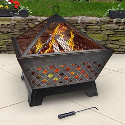 This grate is very versatile, allowing you to use it in or on your firepit. Landmann USA 26.3-in W Antique Bronze Steel Wood-Burning ...