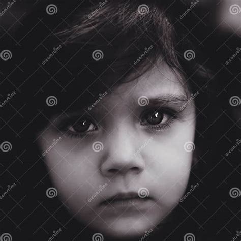Toddler Girl Looking Sad At The Camera Stock Photo Image Of White