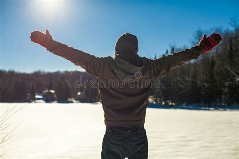 Young Man With His Arms Raised Up In The Sky Stock Photo Image Of