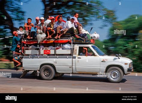 Overcrowded Car People On The Roof Burma Asia Stock Photo Alamy