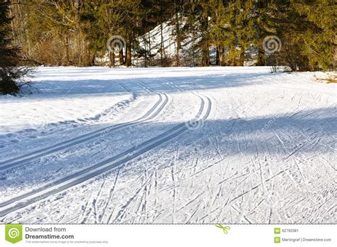 Bright White Snow Field With Ski Trails Stock Image
