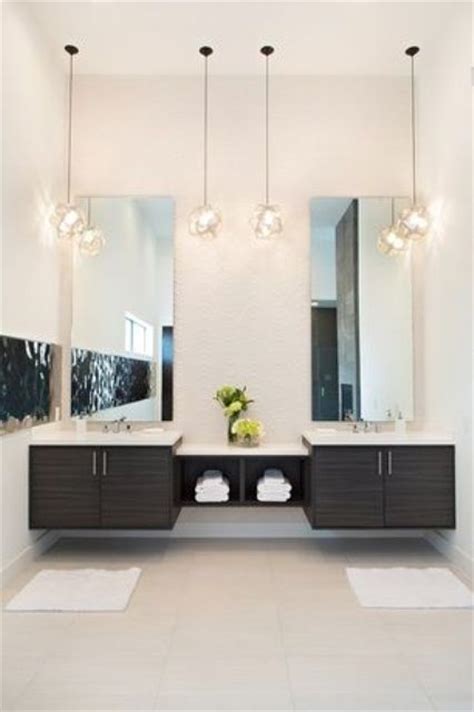 Clean lines offset the asymmetry of the frosted white glass shade and brings modern style to any space. 25 Creative Modern Bathroom Lights Ideas You'll Love ...