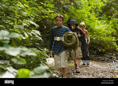 Boys In Forest Stock Photo Alamy