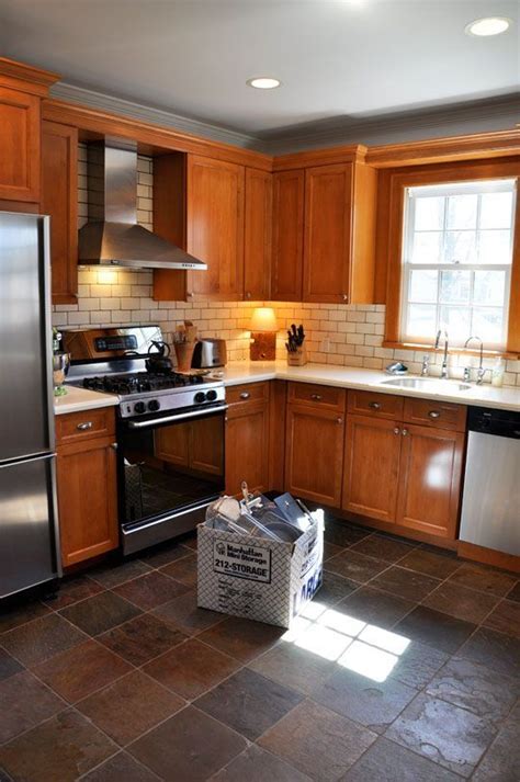 It can be combined with various modern kitchen interior the typical cherry wood textures will still give a sturdy impression to the kitchen even though you don't use its natural colors. modern natural cherry cabinets with white appliances ...