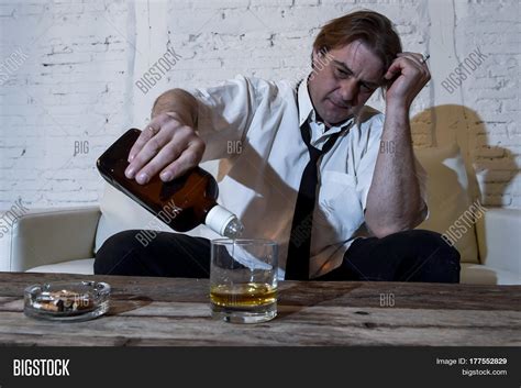 Sad Depressed Alcoholic Businessman Image And Photo Bigstock