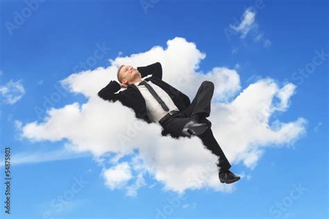 Businessman Sleeping In A Cloud Photo Libre De Droits Sur La Banque D
