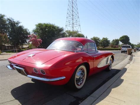 1961 Cherry Cheverolet Corvette 2 Dr Convertible Hard And Soft Top