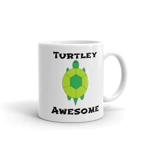 A White Coffee Mug With A Green Turtle On It That Says Turtles Are Awesome