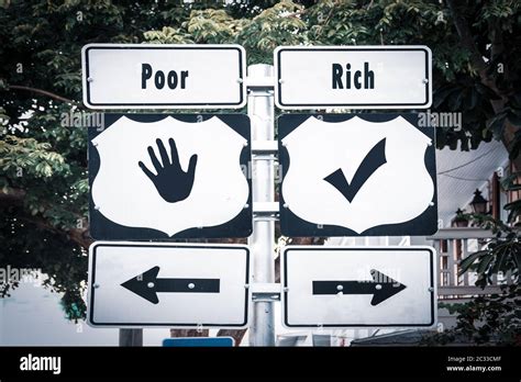 Street Sign Rich Versus Poor Stock Photo Alamy