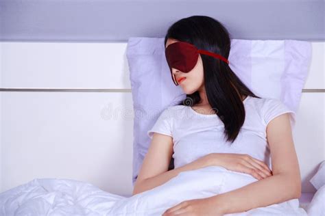 Woman Sleeping With Eye Mask On Bed In Bedroom Stock Image Image Of