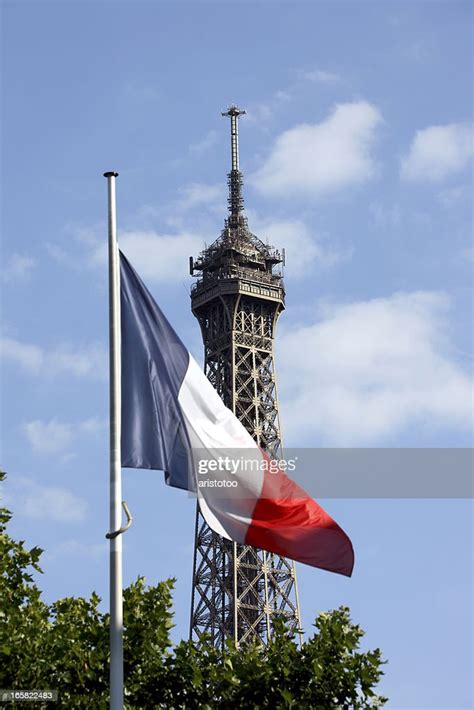 Eiffel Tower And French Flag Paris High Res Stock Photo Getty Images