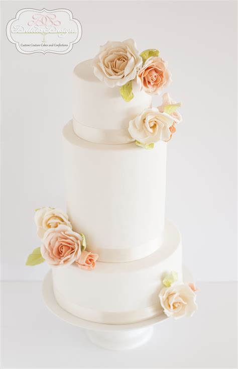 Peach And Cream Roses Wedding Cake