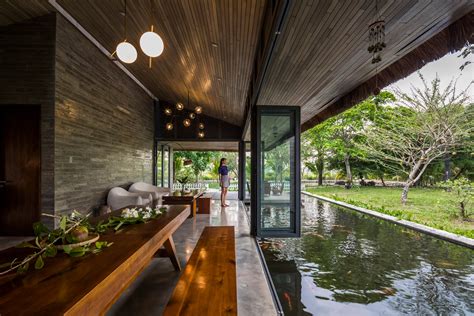 Am House Is A Vietnamese Holiday Home Surrounded By A Pond And Tropical