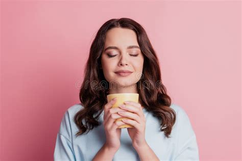 Photo Of Girl Hold Cup Drink Coffee Enjoy Aroma Closed Eyes Stock Photo