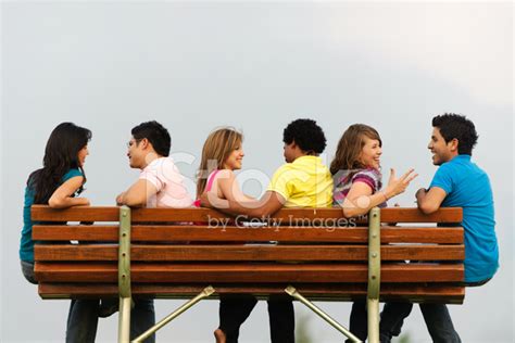 Friends On A Bench Talking Stock Photo Royalty Free Freeimages