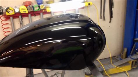 If so, there has to be a difference. Finishing a paint job on motorcycle a gas tank at the UGG ...