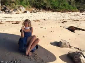 Lara Bingle Shows Cleavages For Photo Shoot On Beach