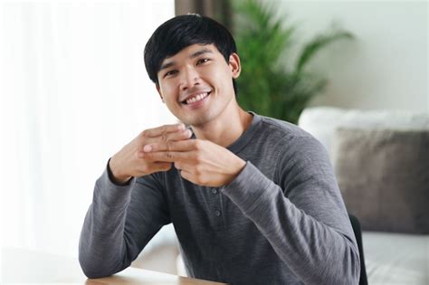 Premium Photo Young Asian Deaf Disabled Man Using Sign Language To