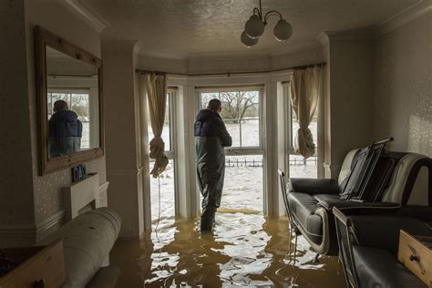 Uk Weather Residents Battle To Save Their Possessions In Flooded Homes