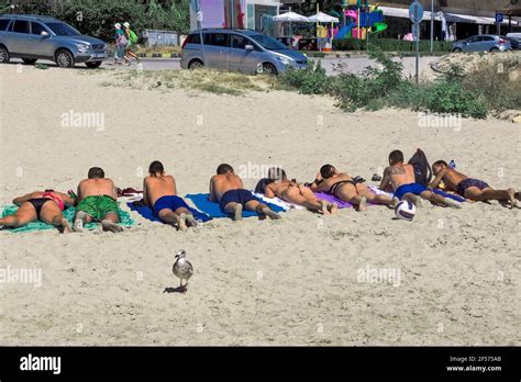 Teenagers Sunbathing Hi Res Stock Photography And Images Alamy