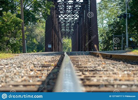 Isolated Rail On Vintage Railway Trestle Crossing The River Stock Image