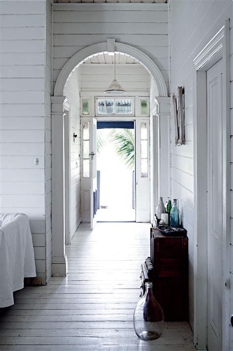 Stunning hamptons style home in brisbane, queensland. A traditional Queenslander home with all-white interior ...