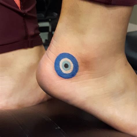 15 tiny evil eye tattoo ideas to ward off misfortune evil eye tattoo eye tattoo greek evil