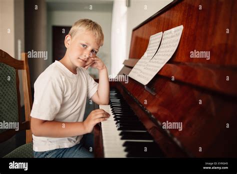 Young Boy Playing The Piano Hi Res Stock Photography And Images Alamy