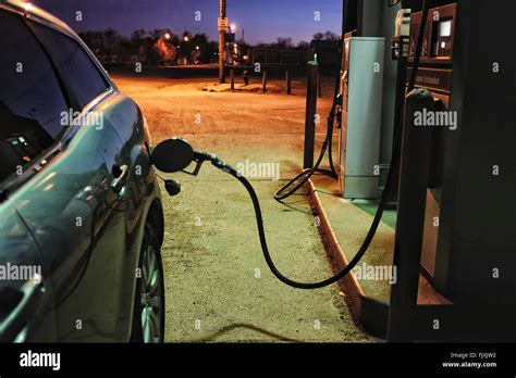 Car Refueling In Gas Station At Night Stock Photo Alamy