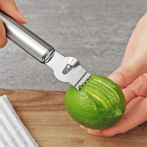 Keep in mind that the zest is the thin, green layer on top of the lime. Kitchen Gadgets Stainless Steel Lemon Peeler Zester Lime Orange Peeler Citrus Fruit Peeling ...