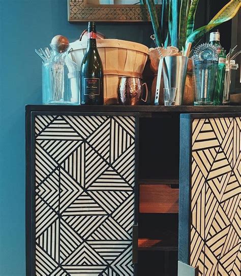 Its opens up to reveal plenty of storage for your bottles and stemware. West elm | Bar cabinet, Interior styling, Entryway tables