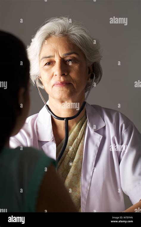Female Doctor Examining Patient Stock Photo Alamy