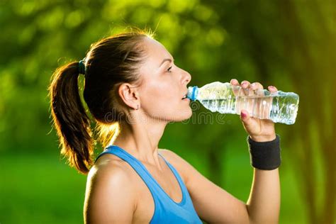 Young Woman Drinking Water After Fitness Exercise Stock Image Image