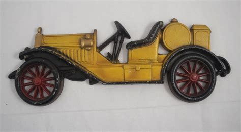 vintage sexton cast metal aluminum yellow antique car wall hanging plaque 13 wall hanging