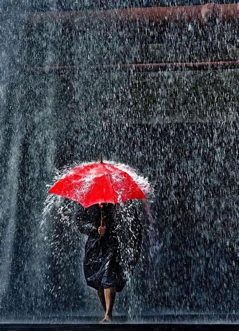 Woman Holding A Red Umbrella And Walking In The Rain Rainy Day