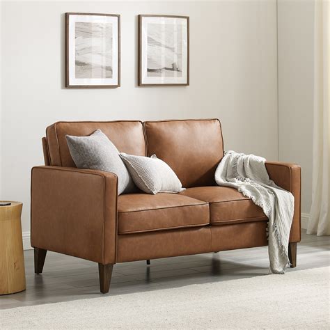 Jianna Faux Leather Loveseat Saddle Brown