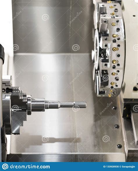 Operator Machining Automotive Part By Cnc Turning Machine Stock Photo