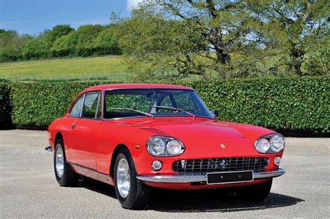 This car has a 2 door coupé body style designed by pininfarina with a front located engine driving through the rear wheels. photo FERRARI 330 GT 2+2 coupé 1964 - Motorlegend.com