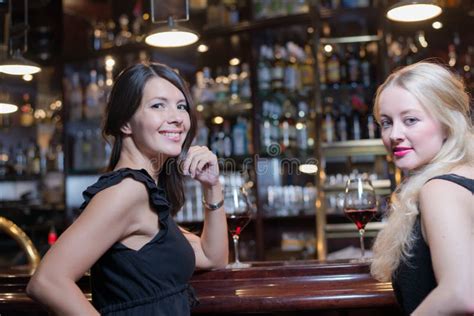 Two Women Drinking At An Upmarket Hotel Stock Image Image Of