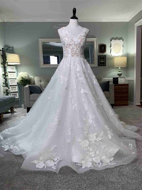 A Line Ivory Wedding Dress With Floral Lace And Pockets Brides