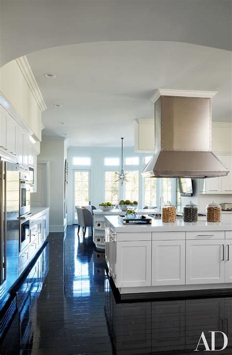 Check out our khloe kardashian selection for the very best in unique or custom, handmade pieces from our shops. White Kitchen with Glossy Black Floors - Transitional ...