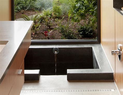 A Sunken Bathtub Is A Creative Feature In This Master Bathroom Sunken