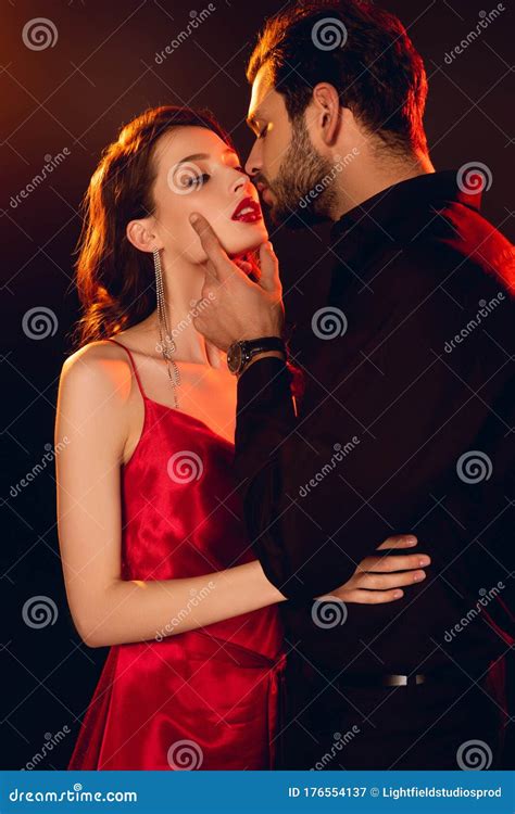 Handsome Man Kissing Elegant Girlfriend With Red Lips Stock Image