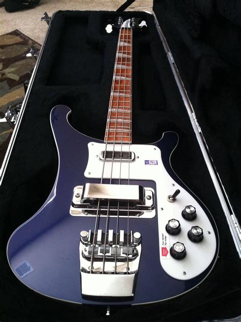 An Electric Bass Guitar In Its Case